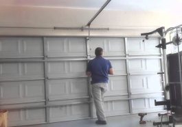 How to Fix a Garage Door Strut