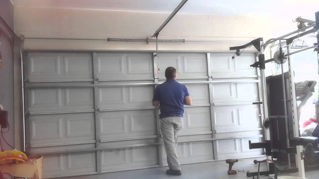 How to Fix a Garage Door Strut